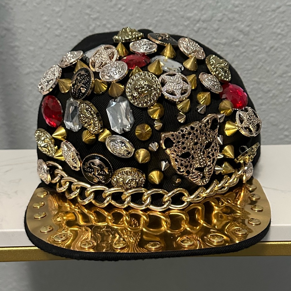Blinged out, gem and studded cap.